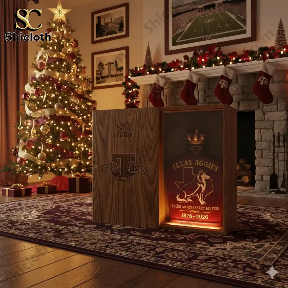 Texas A&M 150th Anniversary Limited Edition Whisky Bottle 3 Texas A&M 150th Anniversary Whisky Bottle displayed in a wooden box with lighting, set in a cozy holiday living room.