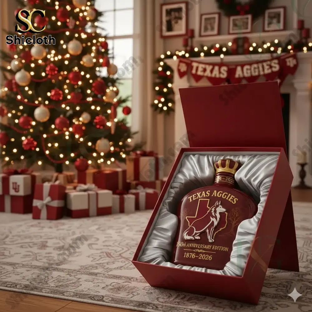 Texas A&M 150th Anniversary Limited Edition Whisky Bottle 4 Texas A&M 150th Anniversary Whisky Bottle displayed in a red box under a decorated Christmas tree in a cozy living room.