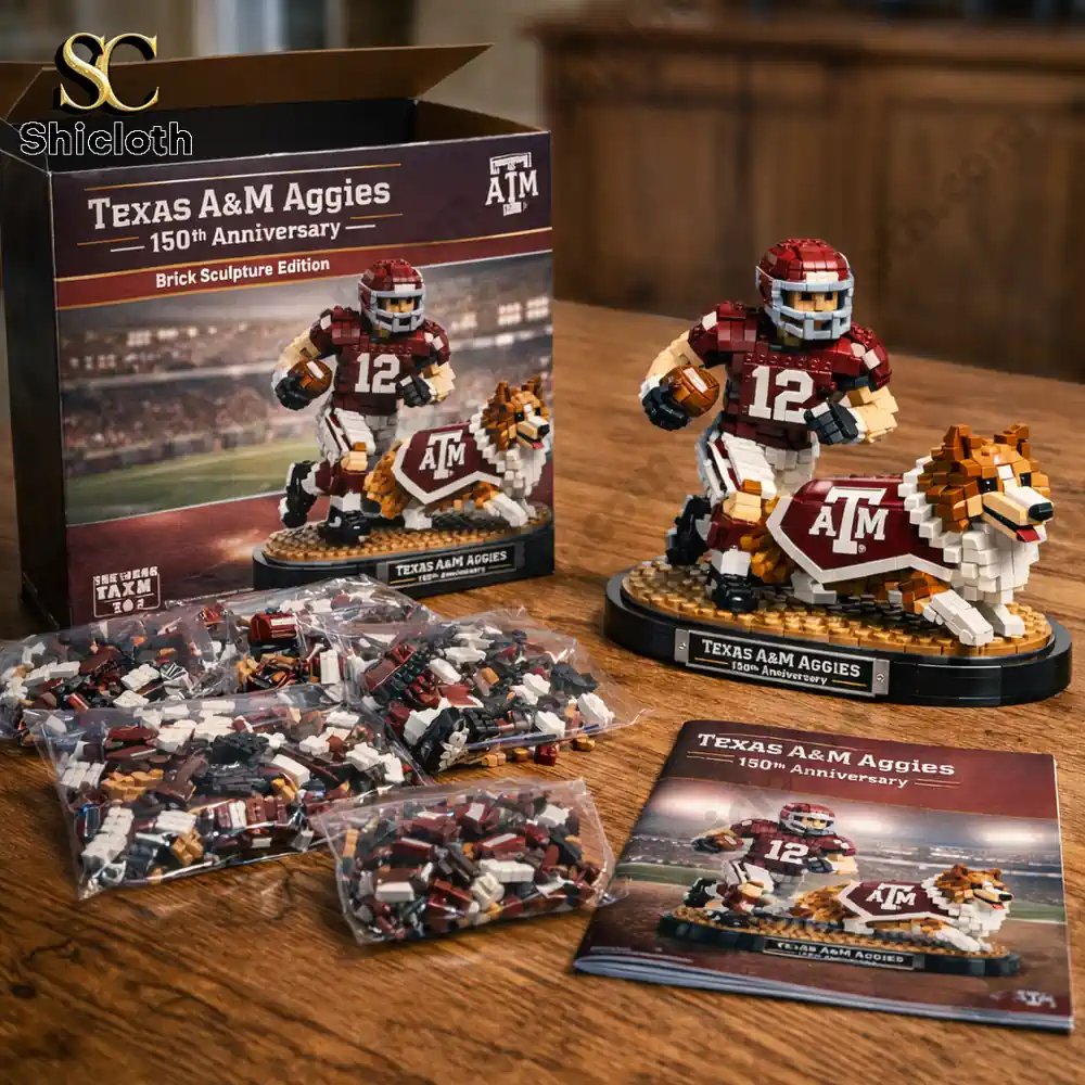 Brick set pieces instruction booklet and completed Texas AM Aggies football player and dog sculpture on a table.