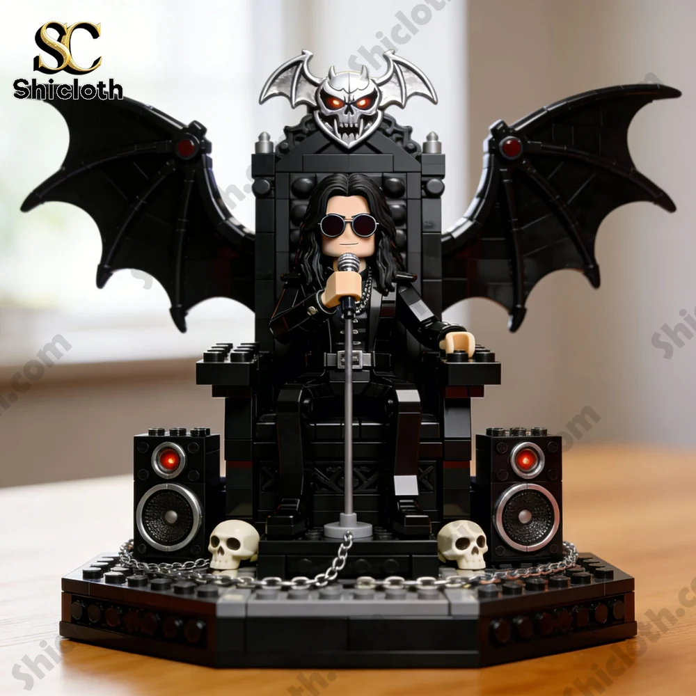 A small toy figure dressed in black sits on a dark throne with bat wings and skull decorations!