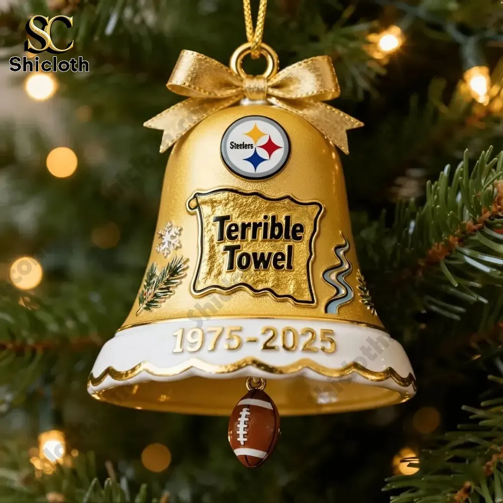 Gold Steelers Terrible Towel bell ornament hanging on a Christmas tree.
