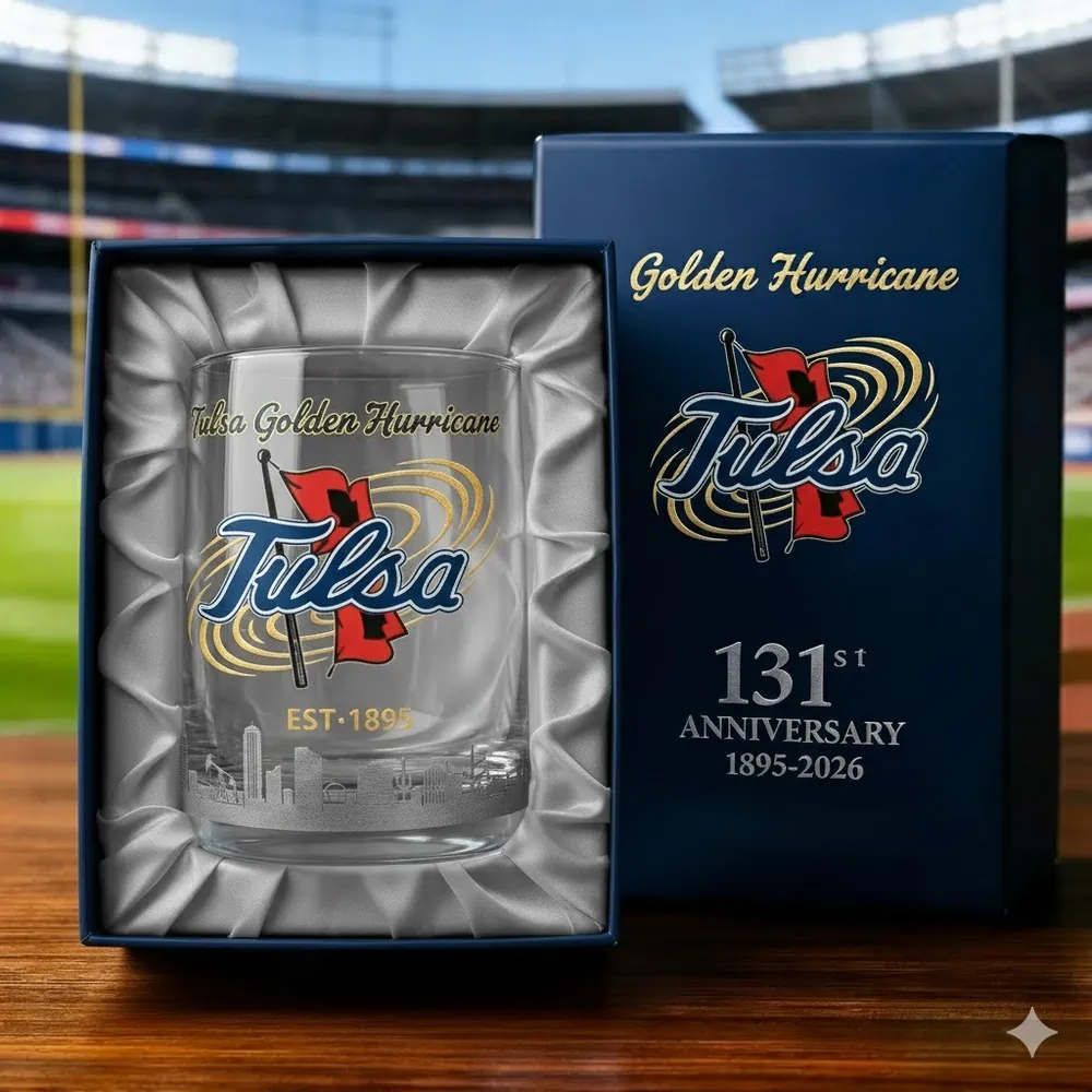 A Tulsa Golden Hurricane anniversary glass resting in a presentation box inside a stadium setting!