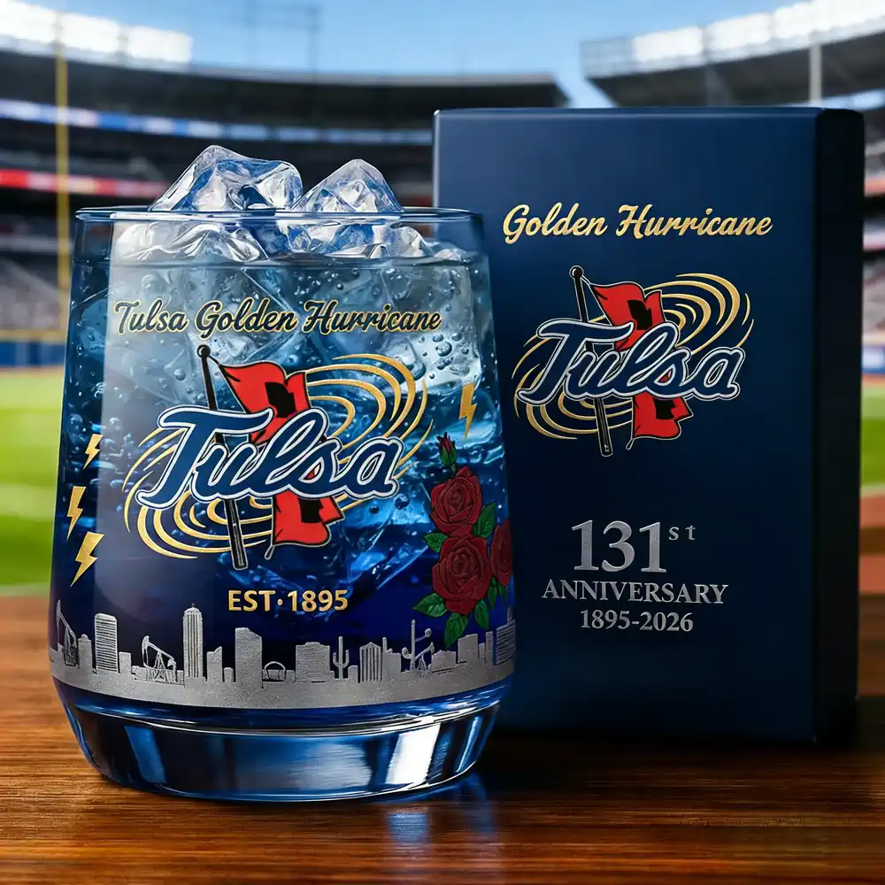 Tulsa Golden Hurricane football 131st Anniversary Christmas Whiskey Glass 3 A Tulsa Golden Hurricane anniversary glass filled with ice displayed beside its presentation box in a stadium scene!