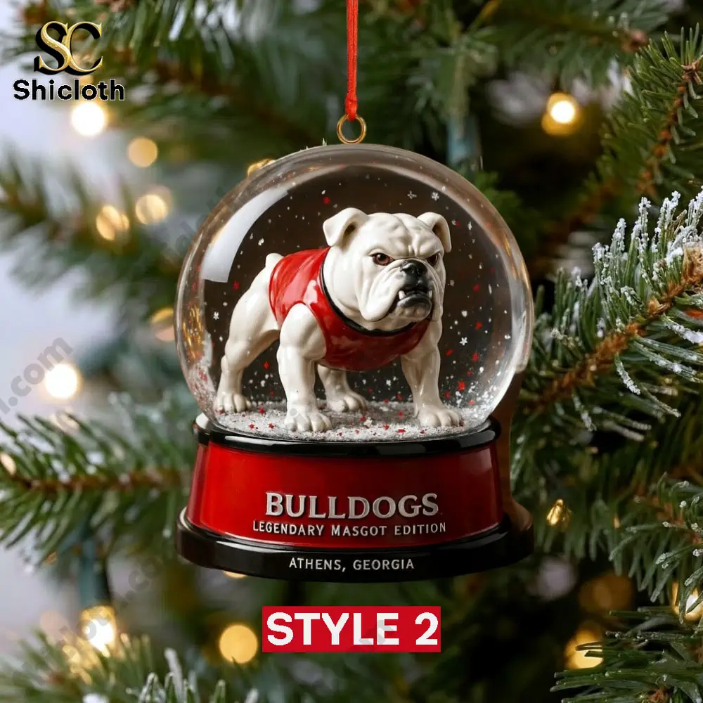 UGA Bulldogs Legendary Mascot Snow Globe Ornament 3 A hanging snow globe ornament featuring a Bulldog mascot figure in a red outfit on a Christmas tree.