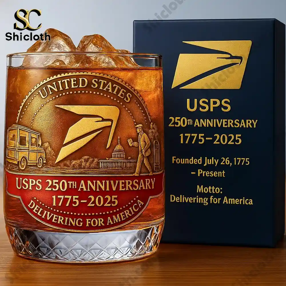 A commemorative rocks glass with golden postal emblem and amber drink!