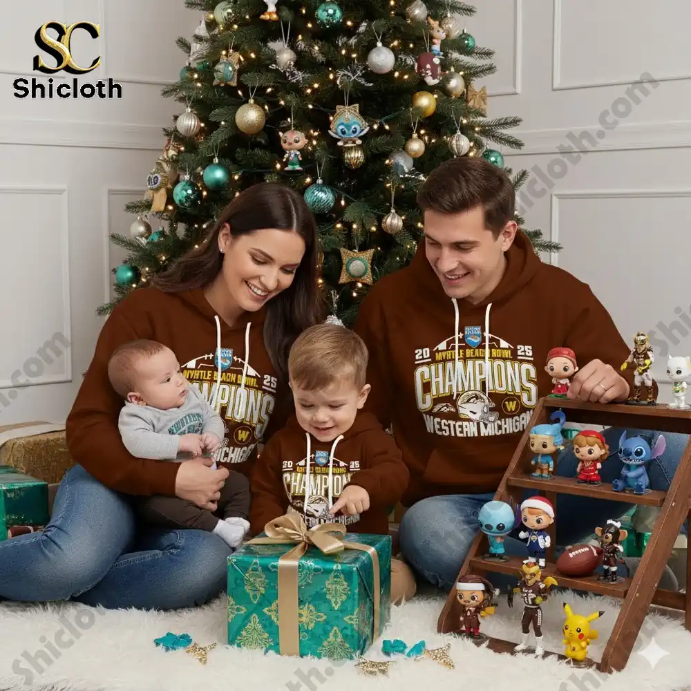 A family wearing matching brown hoodies with Western Michigan champions text sits by a decorated Christmas tree while opening gifts.