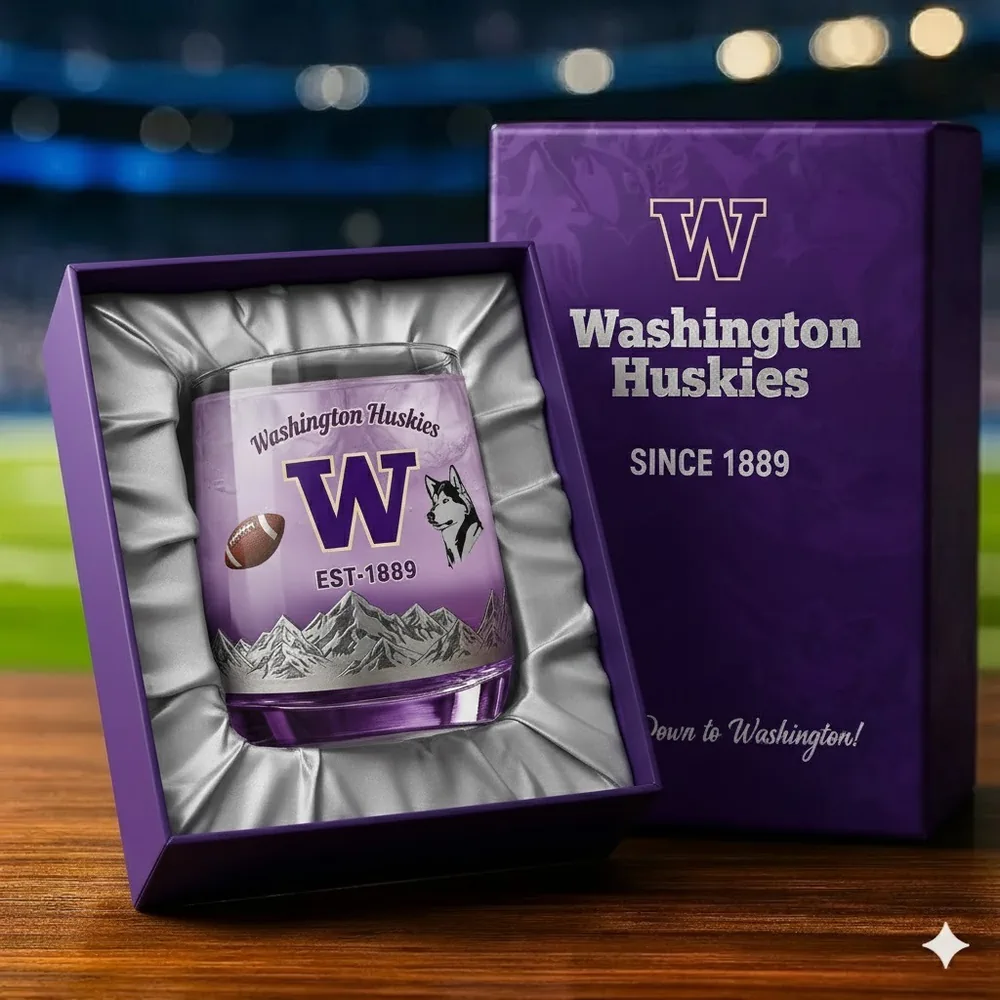 A Washington Huskies glass in a purple gift box with satin lining.