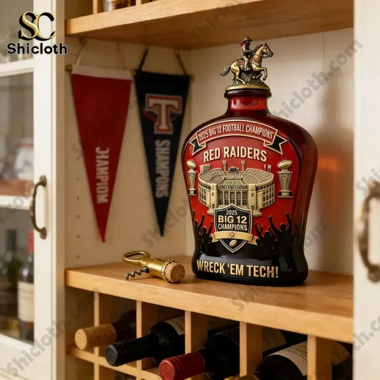Red Raiders whiskey decanter displayed on a shelf with Texas Tech memorabilia.