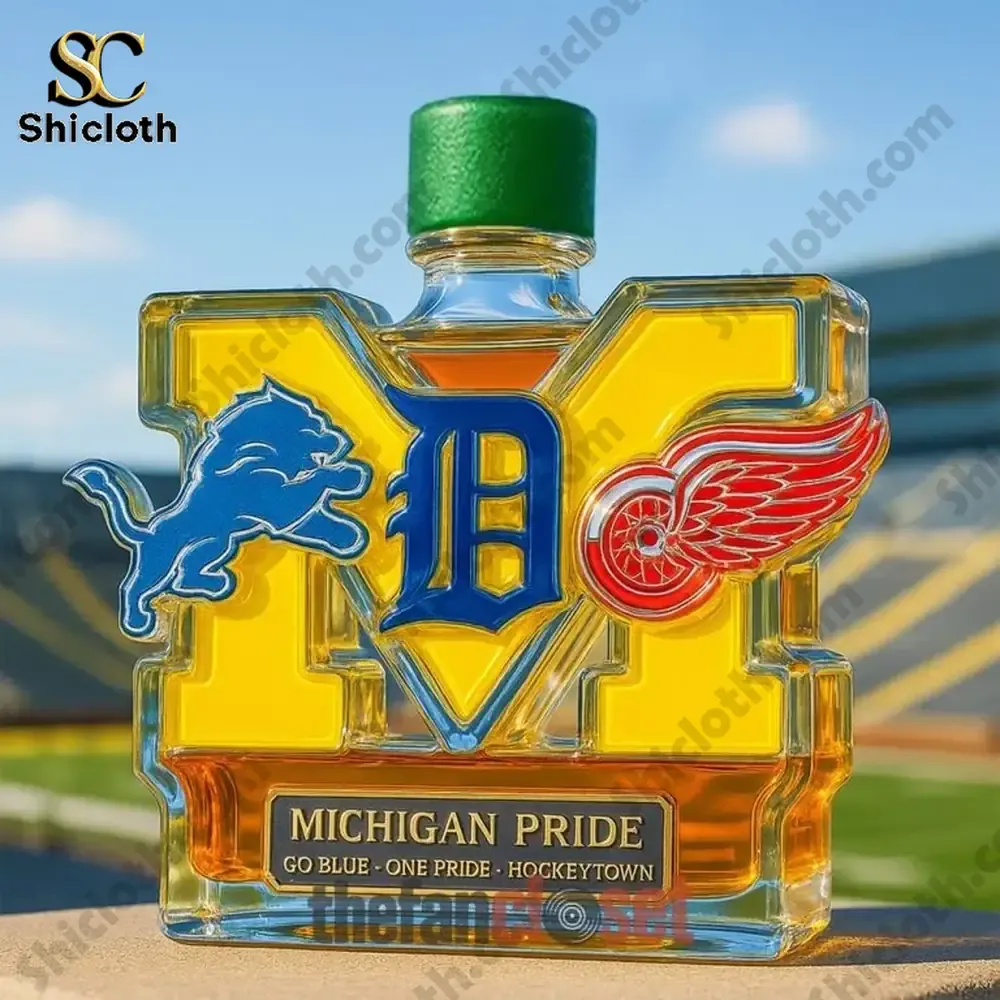Michigan Pride bottle with green top and Michigan sports logos outdoors!