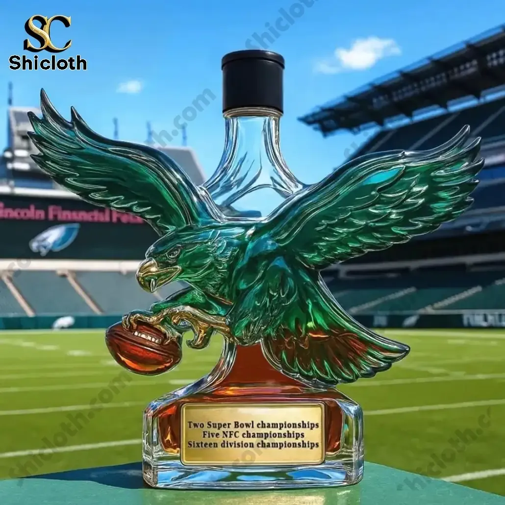 Philadelphia Eagles Retro Logo Christmas Whiskey Bottle 7 Eagle shaped whiskey bottle with black top shown on a stadium field!