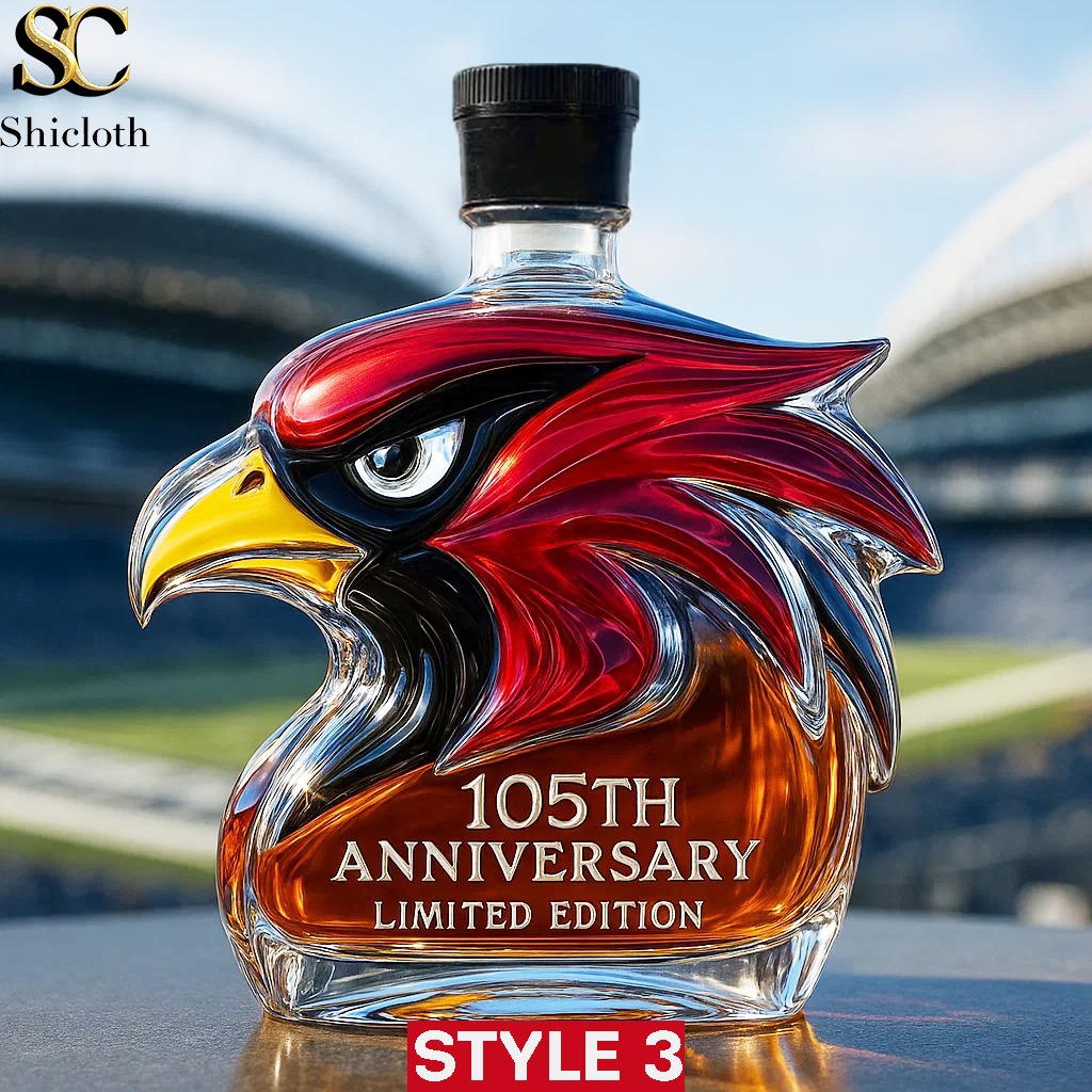 Arizona Cardinals 105th Anniversary Limited Edition Whiskey Bottle Christmas Gift 4 A Shicloth cardinal shaped one hundred fifth anniversary bottle with a black cap displayed outdoors near a stadium.