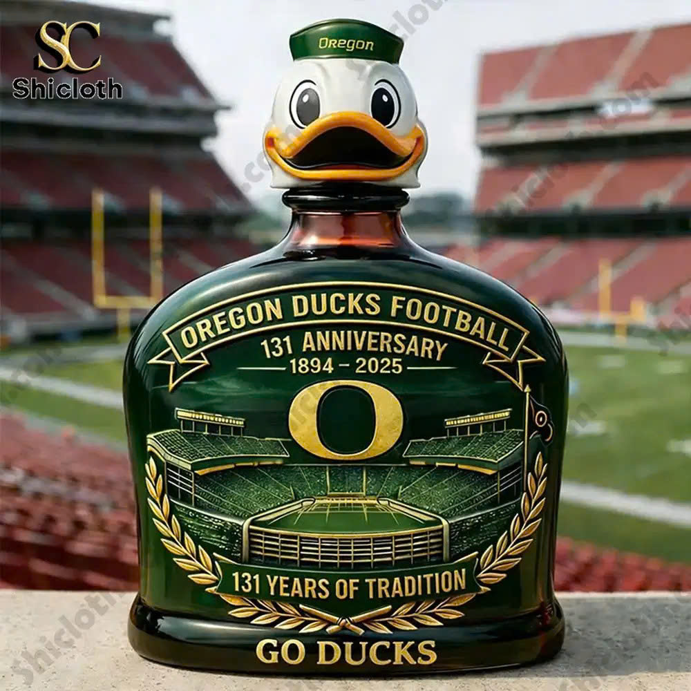 A collectible Oregon Ducks football anniversary bottle with a duck mascot and stadium design.
