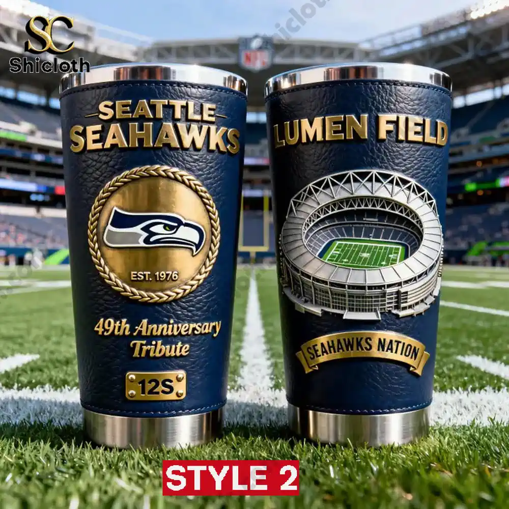 Two Seattle Seahawks anniversary tumblers standing on a football field!
