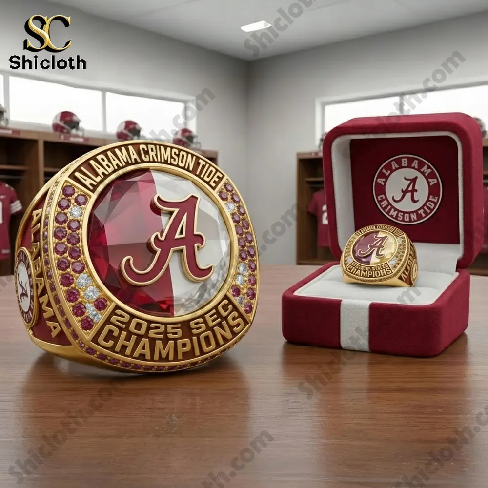 Large Alabama Crimson Tide championship ring on table.