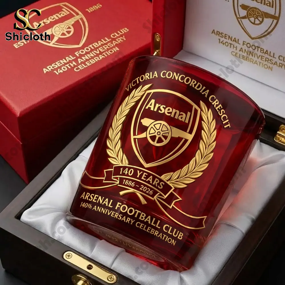 Close up of a red Arsenal anniversary glass in a luxury box!