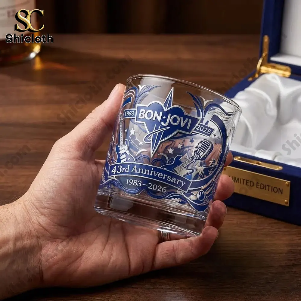 Bon Jovi 43rd Anniversary Collector's Glass 5 Hand holding Bon Jovi anniversary whiskey glass close up from Shicloth!