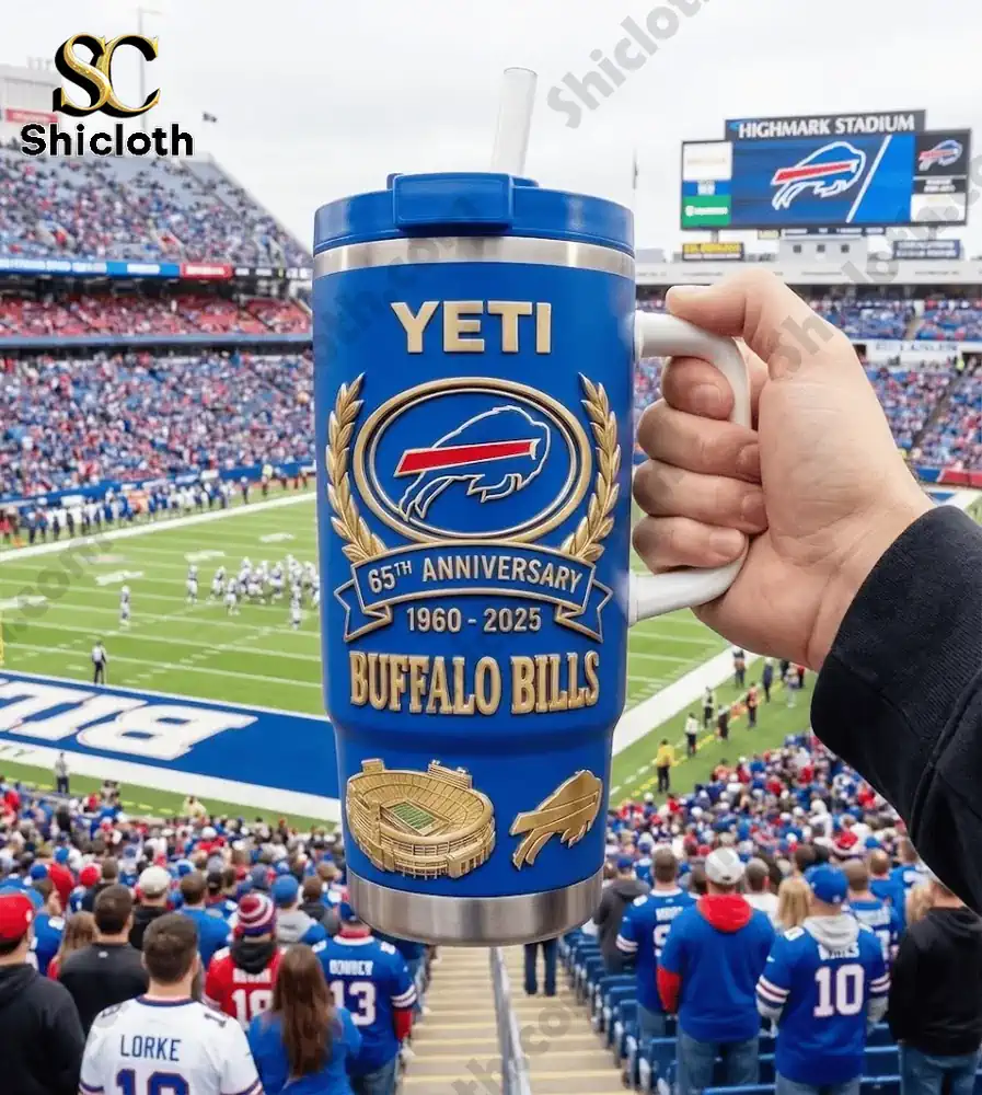 Hand holding a blue YETI Buffalo Bills mug inside a packed football stadium!