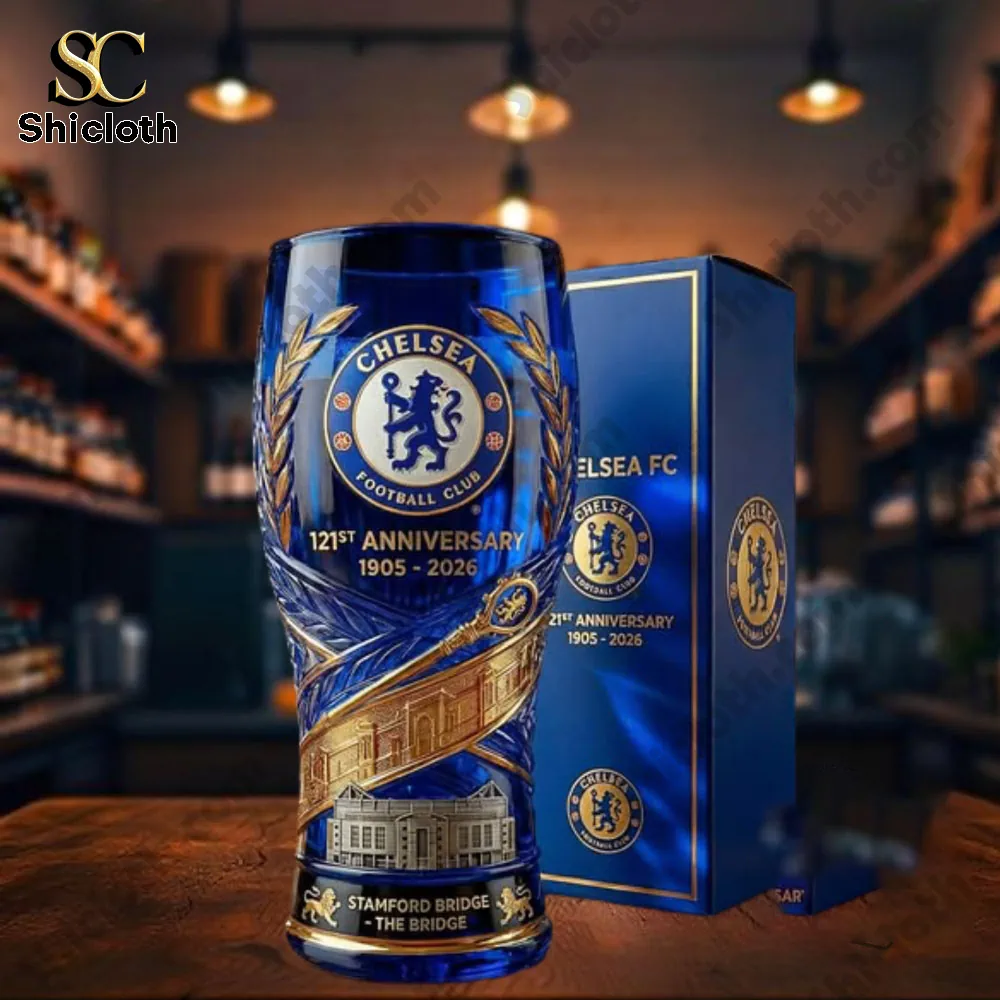 Blue football club anniversary glass with decorative box on wooden table!