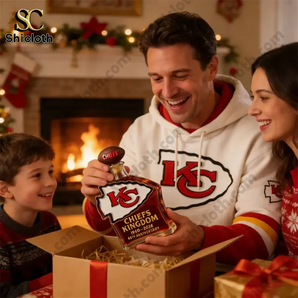 Family opening a Chiefs Kingdom anniversary bottle at home!
