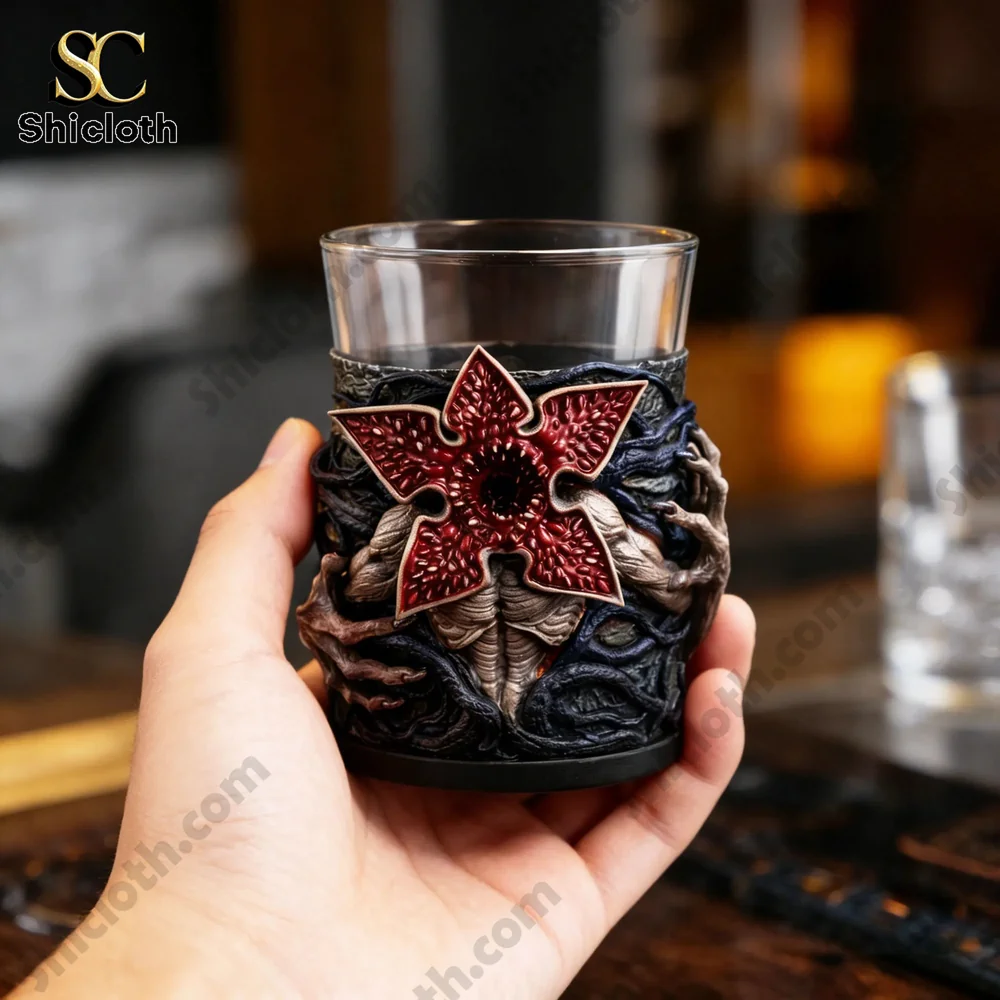 Demogorgon Sculpted Whiskey Glass 3 Hand holding a detailed horror themed sculpted whiskey glass!