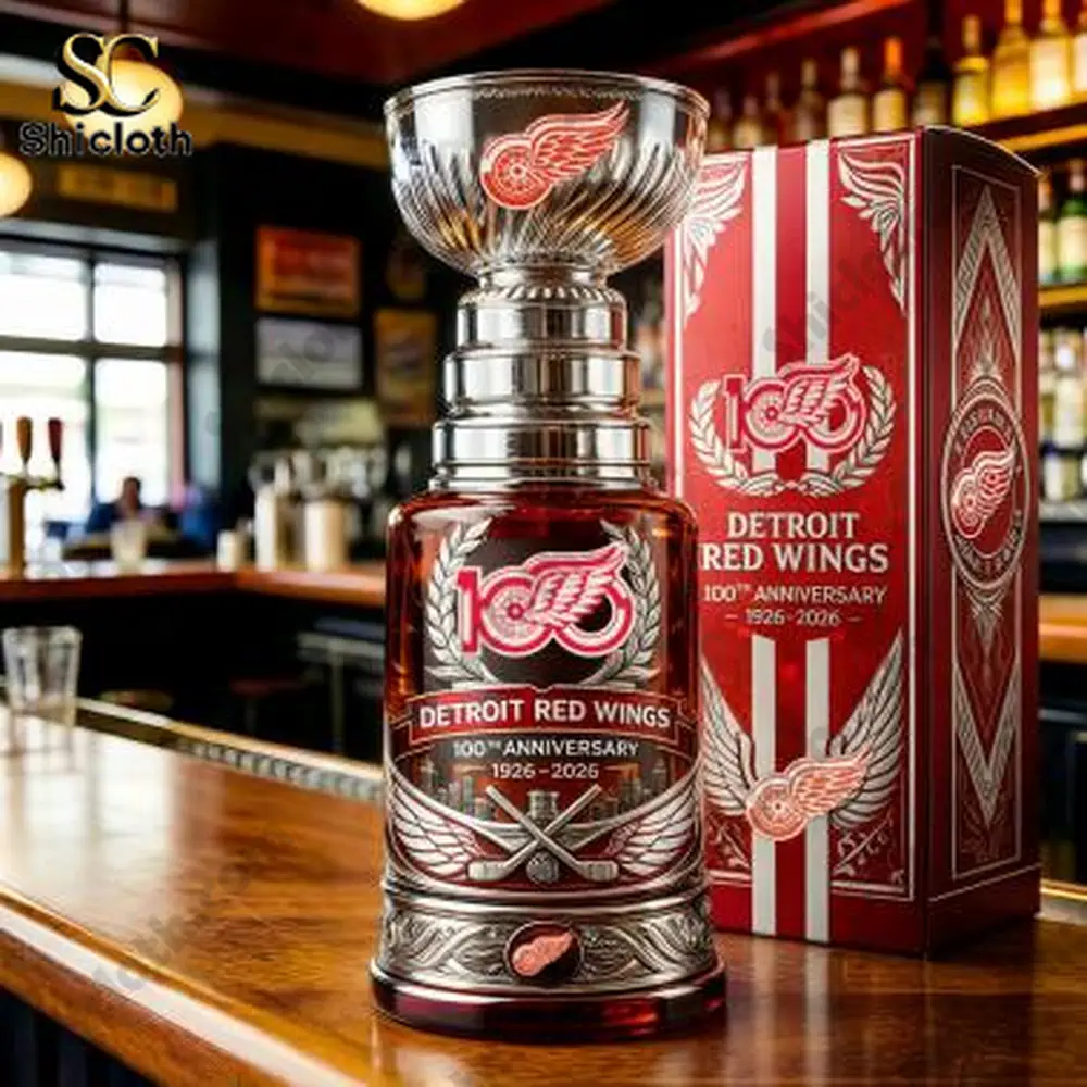 Detroit Red Wings anniversary whiskey bottle and box displayed on bar counter!