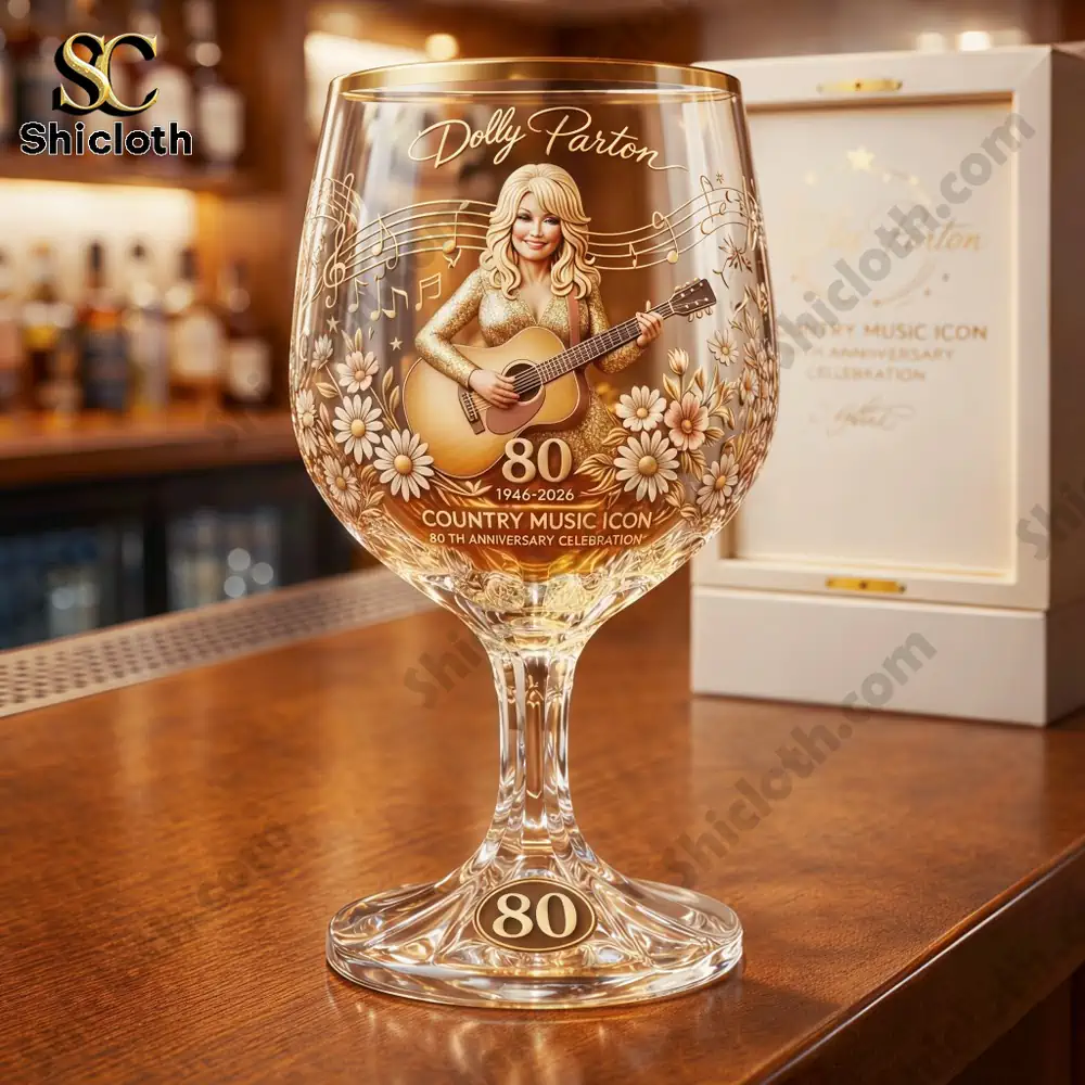 Decorative wine glass with country music illustration displayed on a wooden bar!