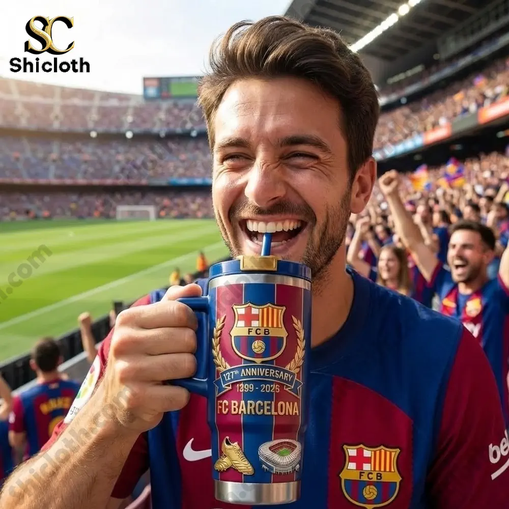 FC Barcelona 127th Anniversary 1899 - 2026 Tumbler With Handle And Straw 4 Happy FC Barcelona fan drinking from anniversary tumbler at stadium!