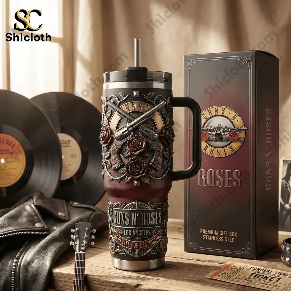 Guns N Roses tumbler on wooden table with vinyl records.