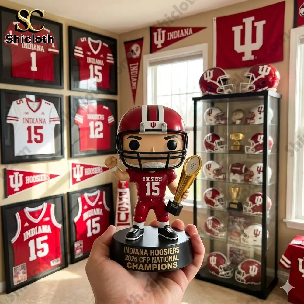 Mike Tomlin End Of An Era Pittsburgh Steelers Commemorative Pop Figure 22 Indiana Hoosiers collector football figure holding championship trophy in a memorabilia room!