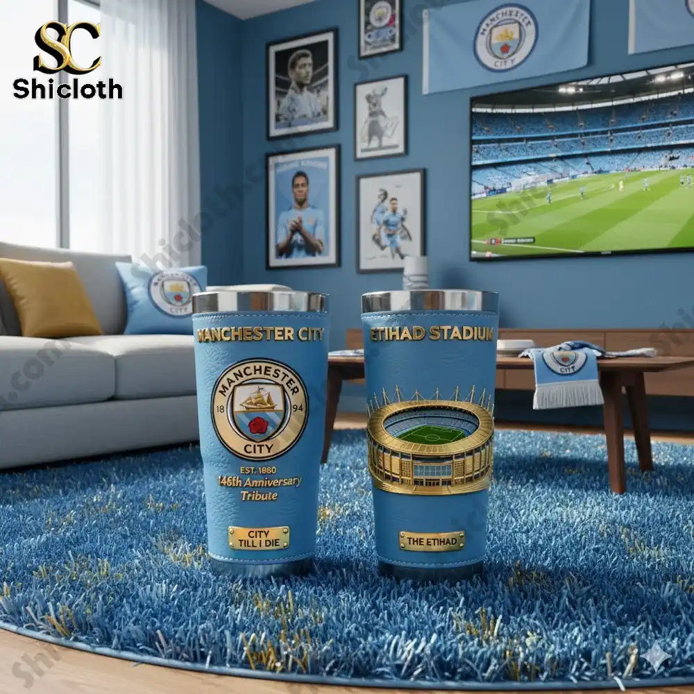 Manchester City themed tumblers displayed in a fan living room with match on television!