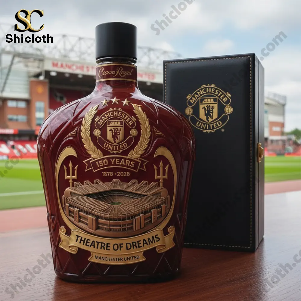Manchester United themed whisky decanter displayed near a football stadium.