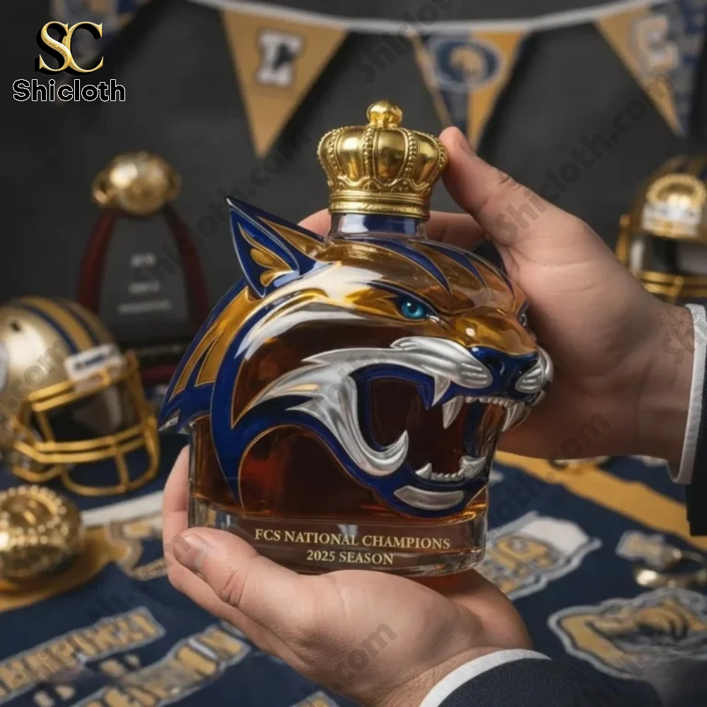 Hands holding crowned wildcat champion bottle close up!