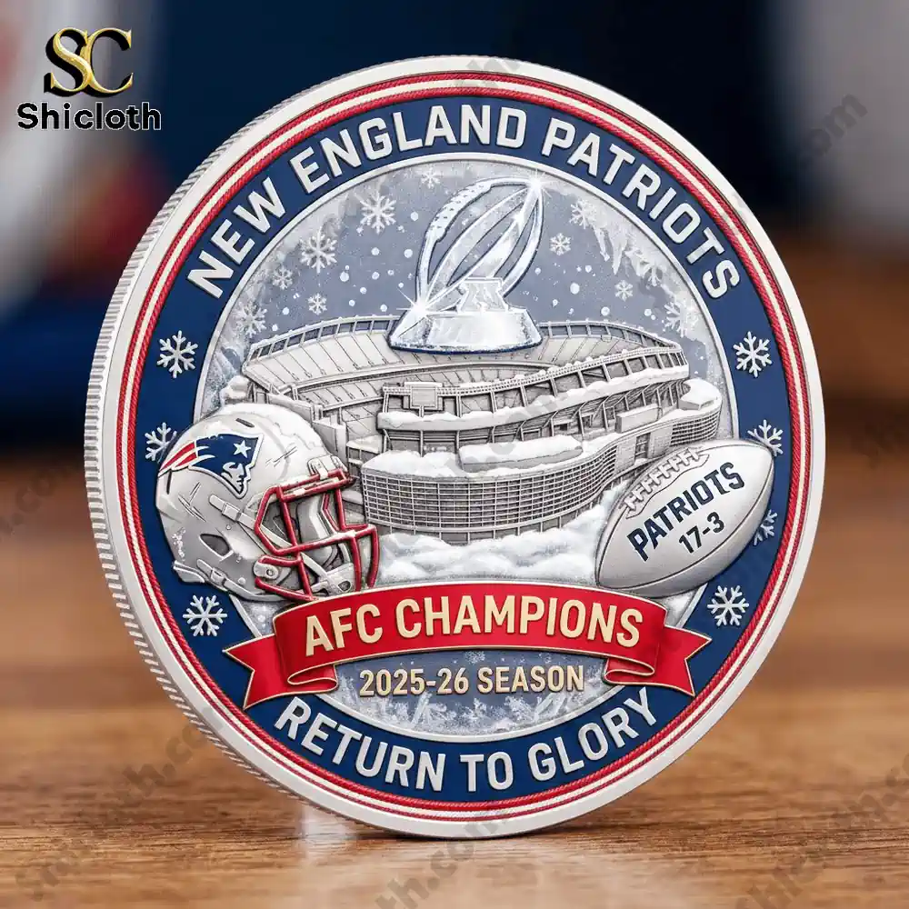 Front view of New England Patriots commemorative coin on wooden surface!