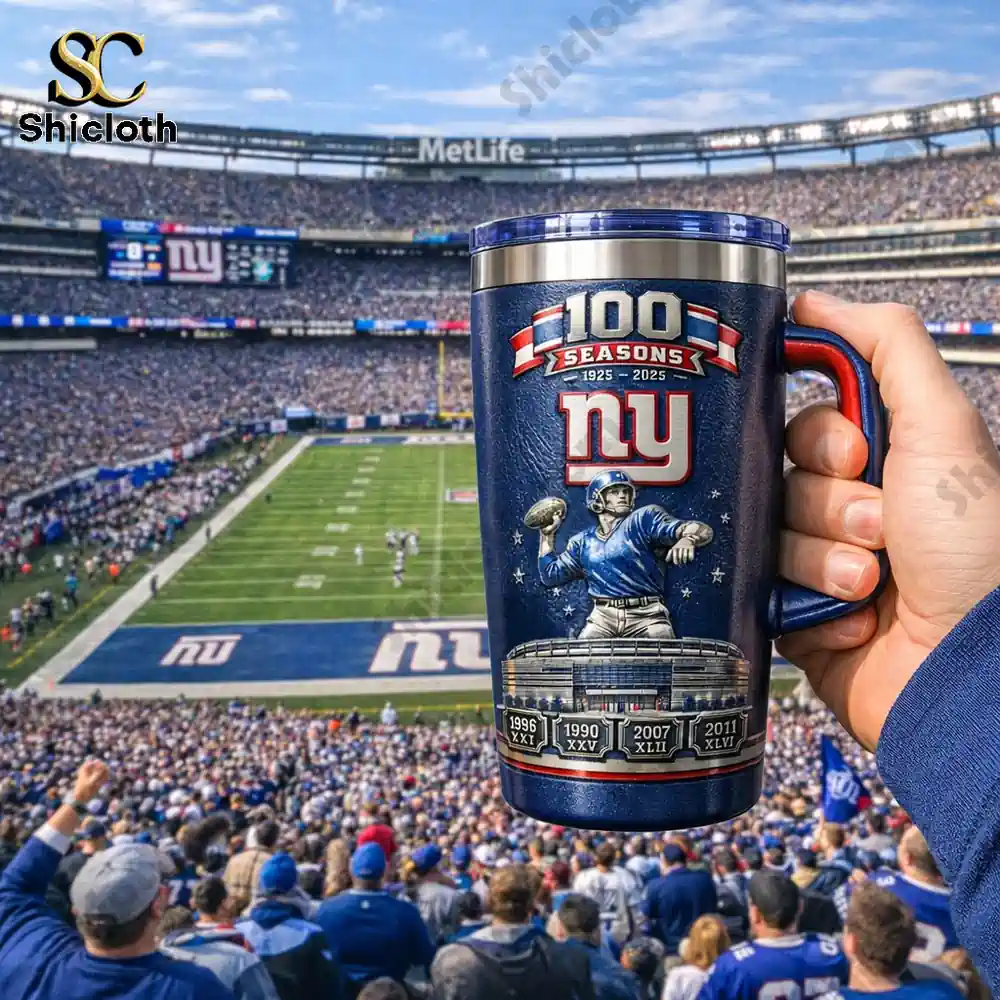 New York Giants 100 Seasons mug held by hand inside a packed stadium!