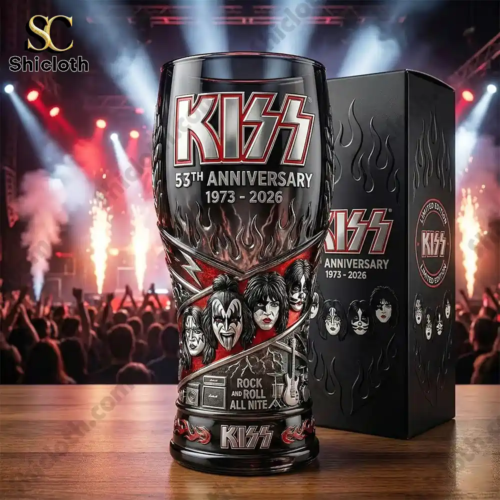 KISS anniversary beer glass displayed on table with concert stage background!