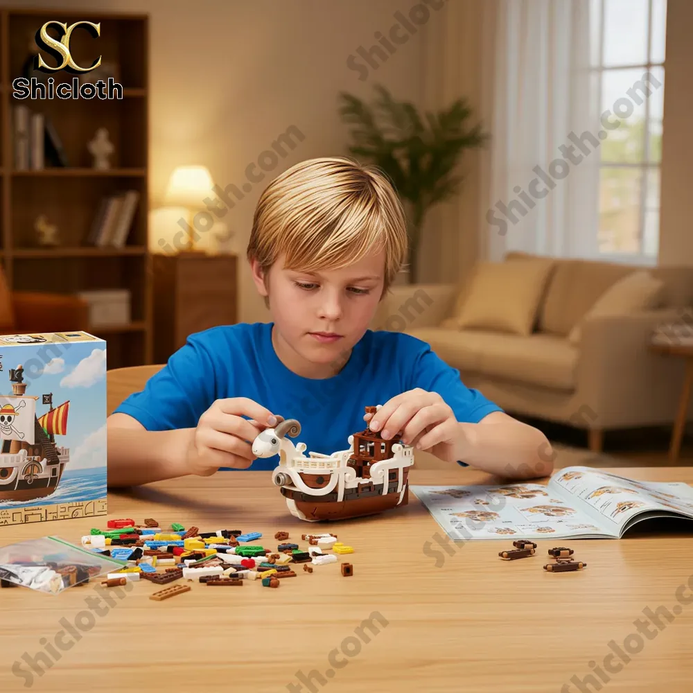 A child building the Going Merry brick ship at a table!