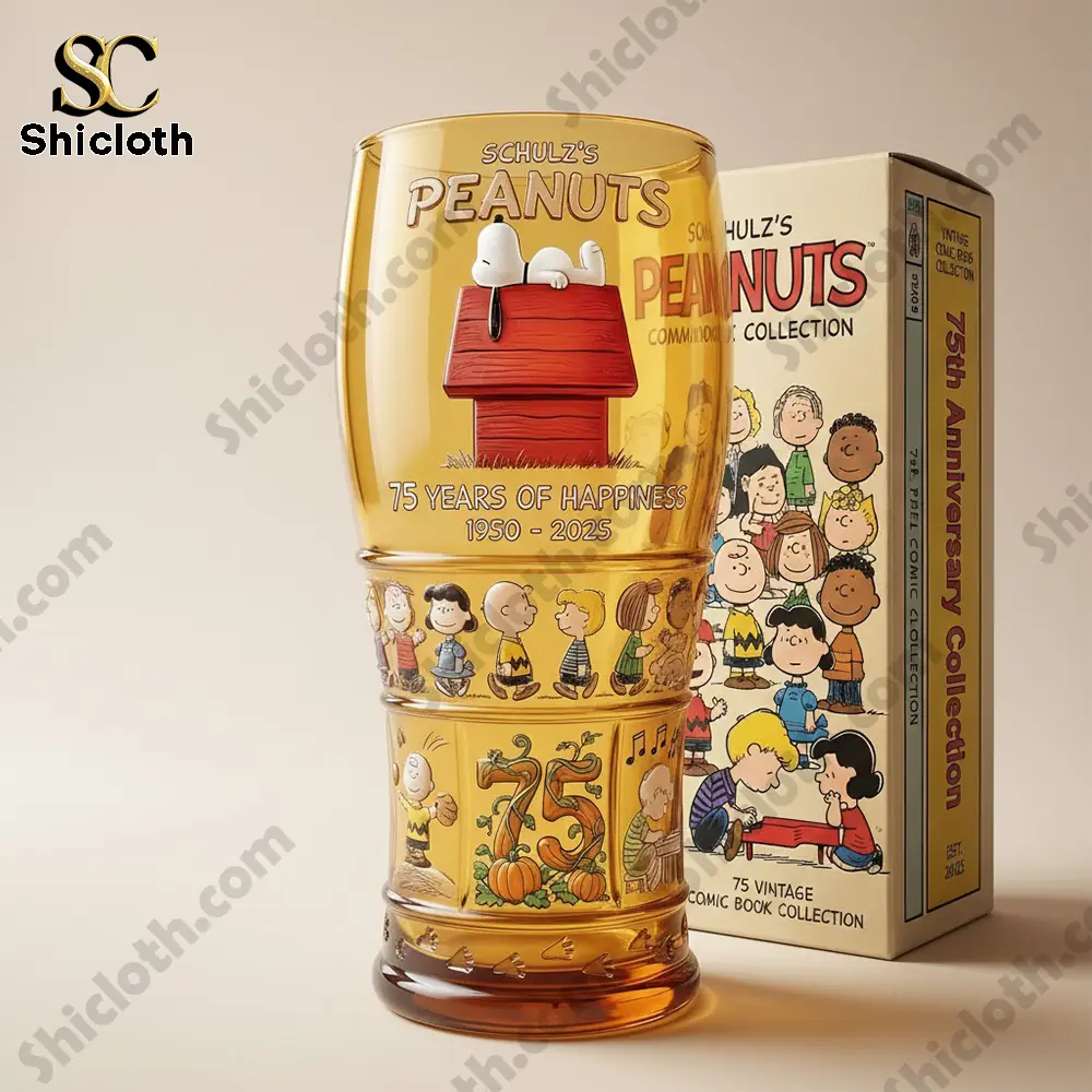 Peanuts themed collector beer glass with anniversary packaging on clean background!