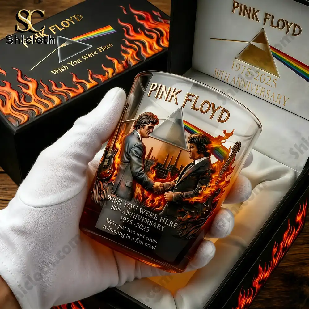 Pink Floyd Wish You Were Here 50th Anniversary Whiskey Glass 3 Close up of a Pink Floyd themed whiskey glass held in hand by Shicloth!