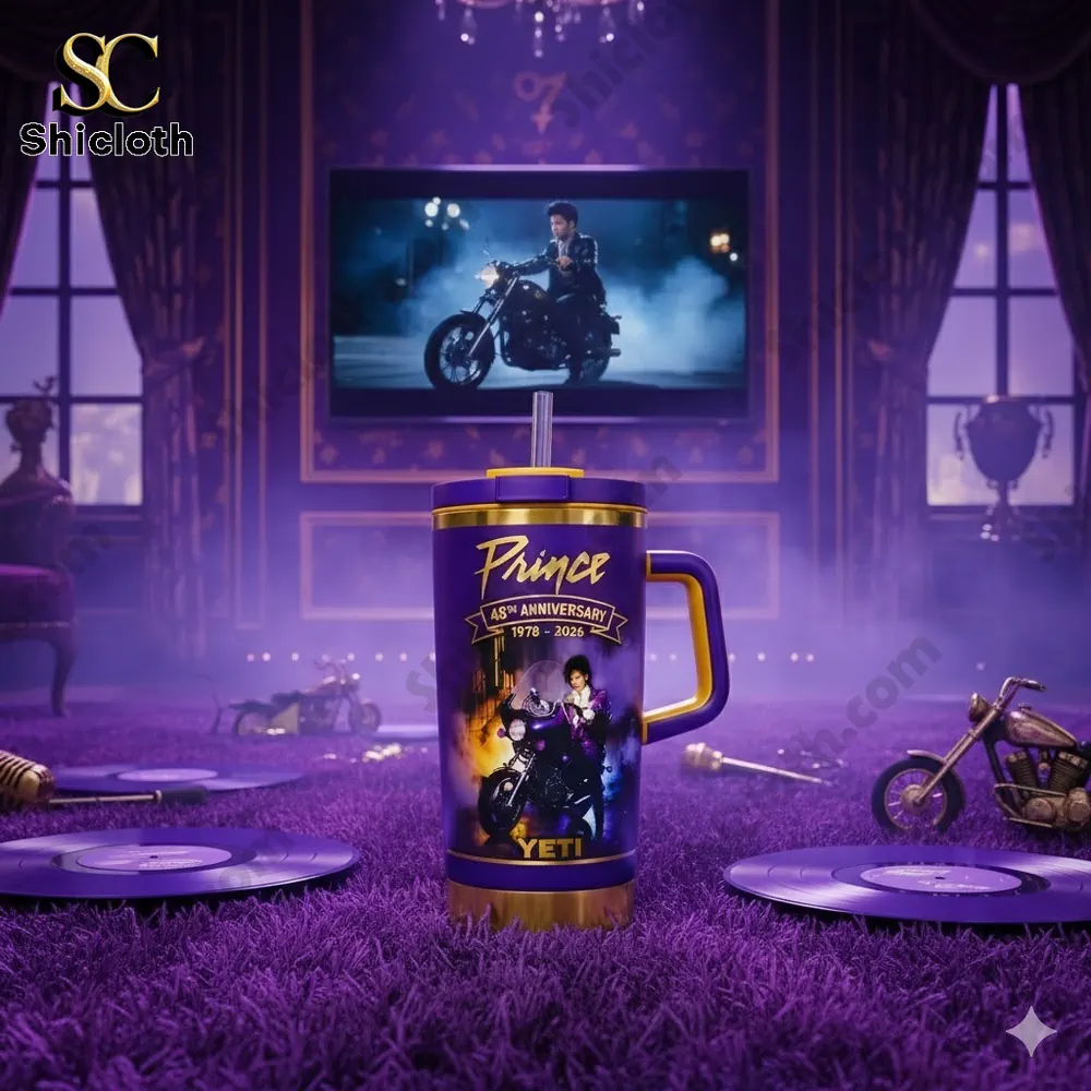 Purple Prince themed insulated tumbler with handle and straw displayed in dramatic stage setting!