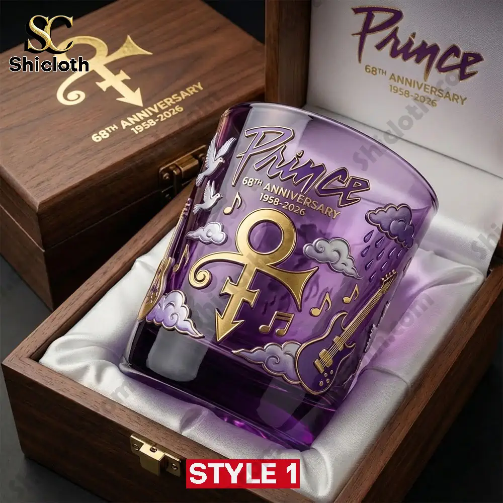 Purple commemorative glass displayed inside a wooden gift box.