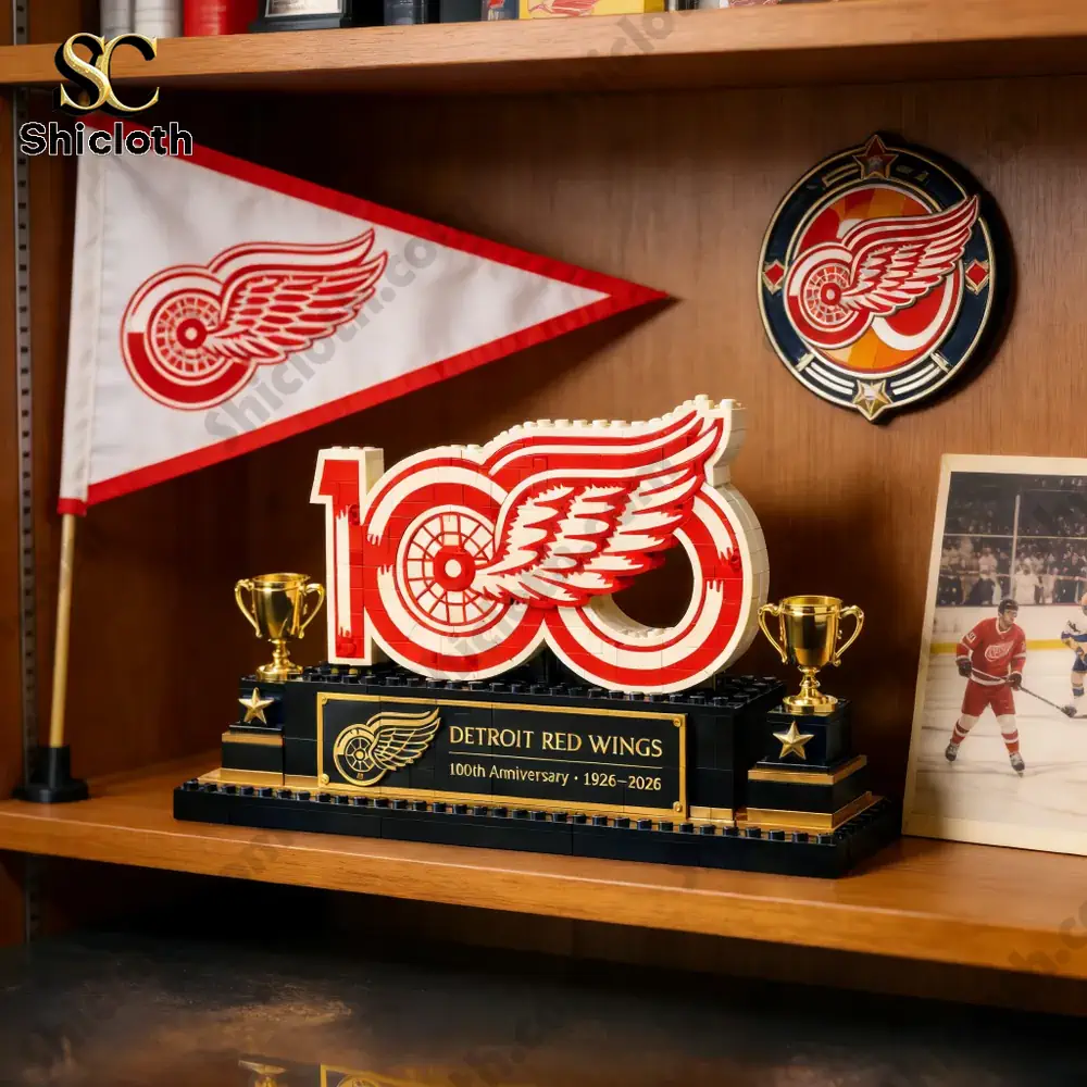 Detroit Red Wings centennial brick display on wooden shelf with flag and emblem!