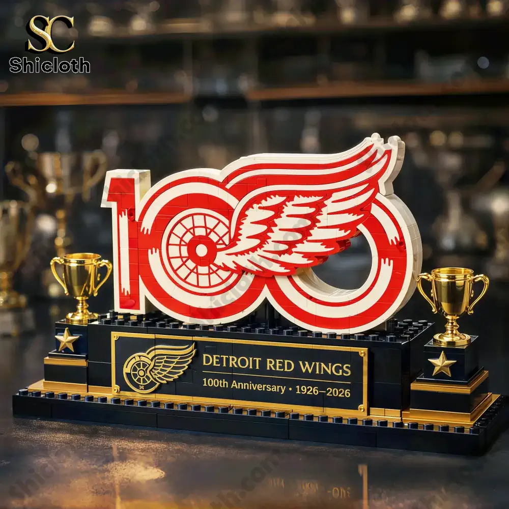 Detroit Red Wings one hundred anniversary brick display on tabletop with trophies!