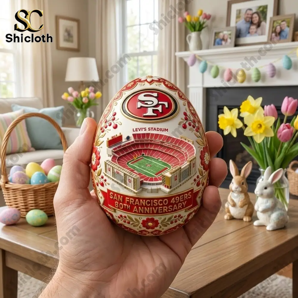 San Francisco 49ers 80th Anniversary Commemorative Easter Figure 3 Hand holding San Francisco 49ers anniversary egg indoors!