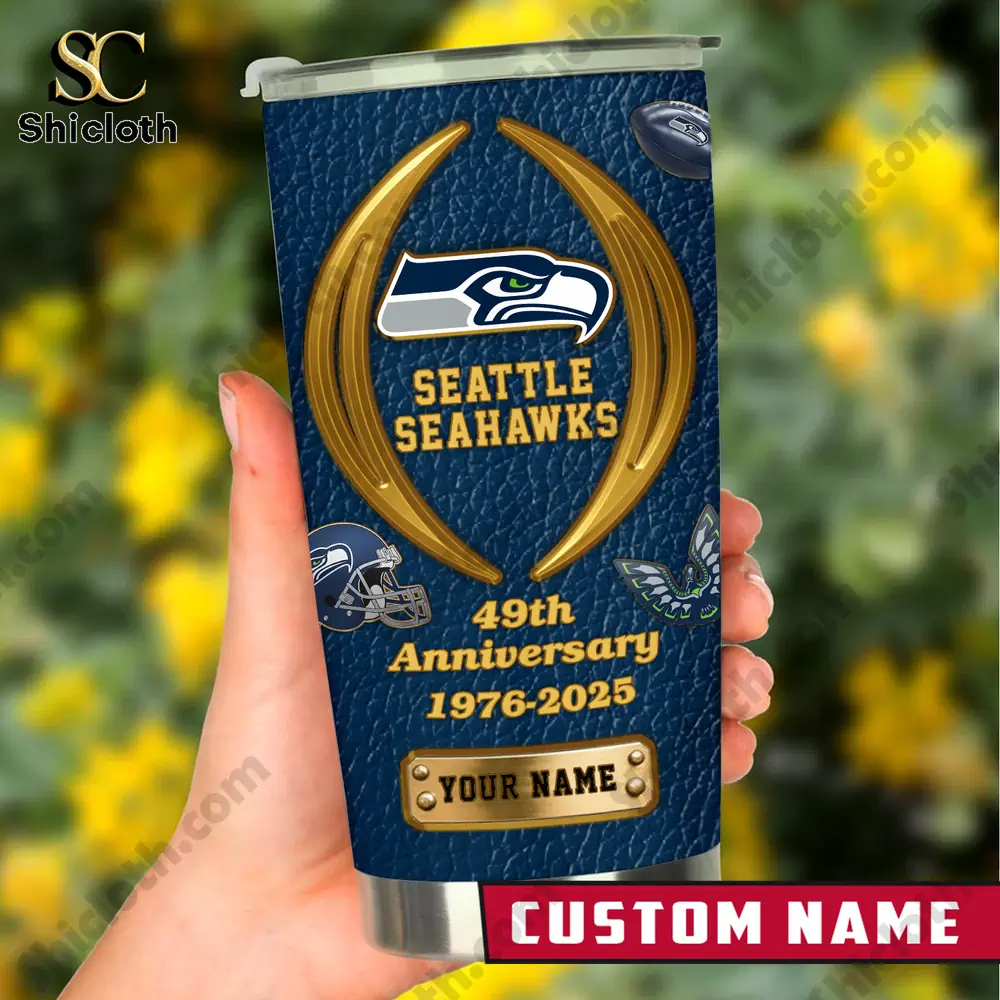 Hand holding Seattle Seahawks anniversary tumbler with custom name!