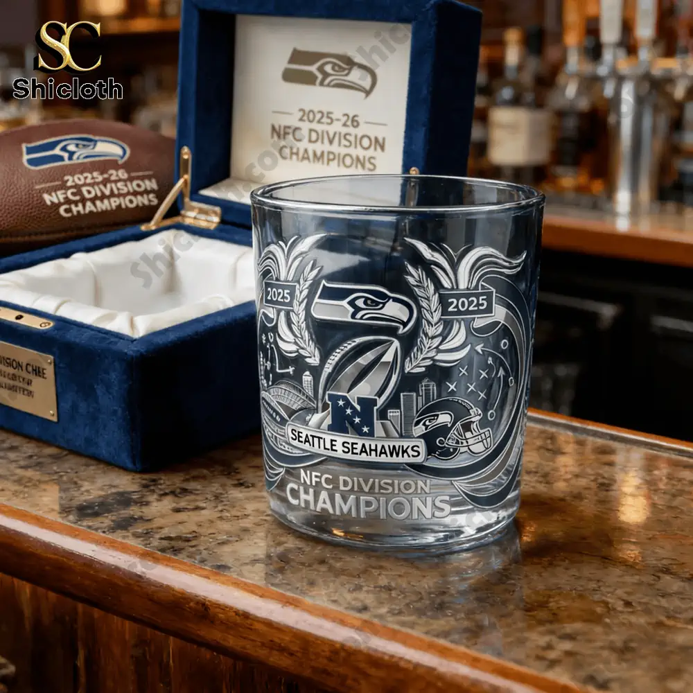 Seattle Seahawks NFC Champions 3D Visual Effect Whiskey Glass 330m 3 Seattle Seahawks division champions crystal whiskey glass on a wooden bar counter!