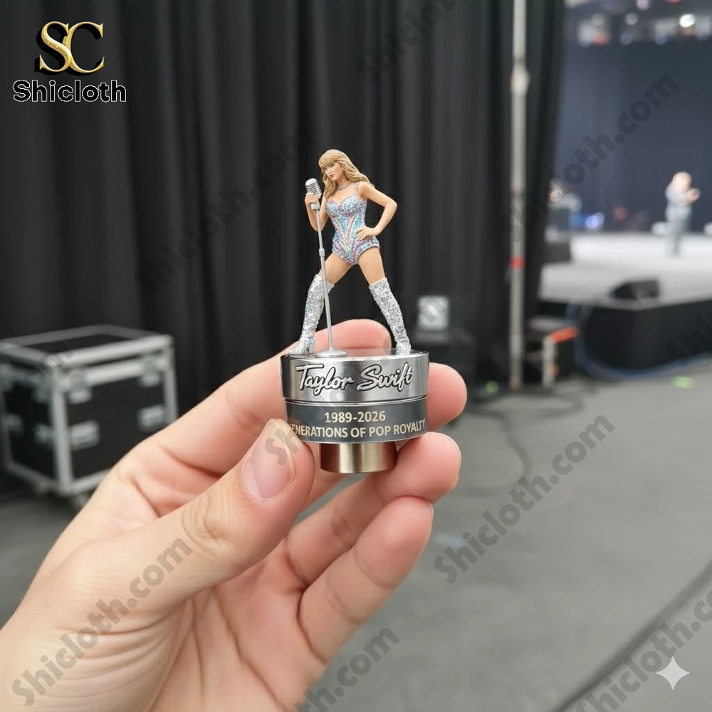 Mini pop singer figure with microphone on a metal base held in a hand!