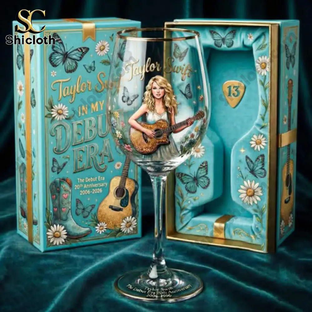Decorative debut era wine glass with gift box on teal fabric!