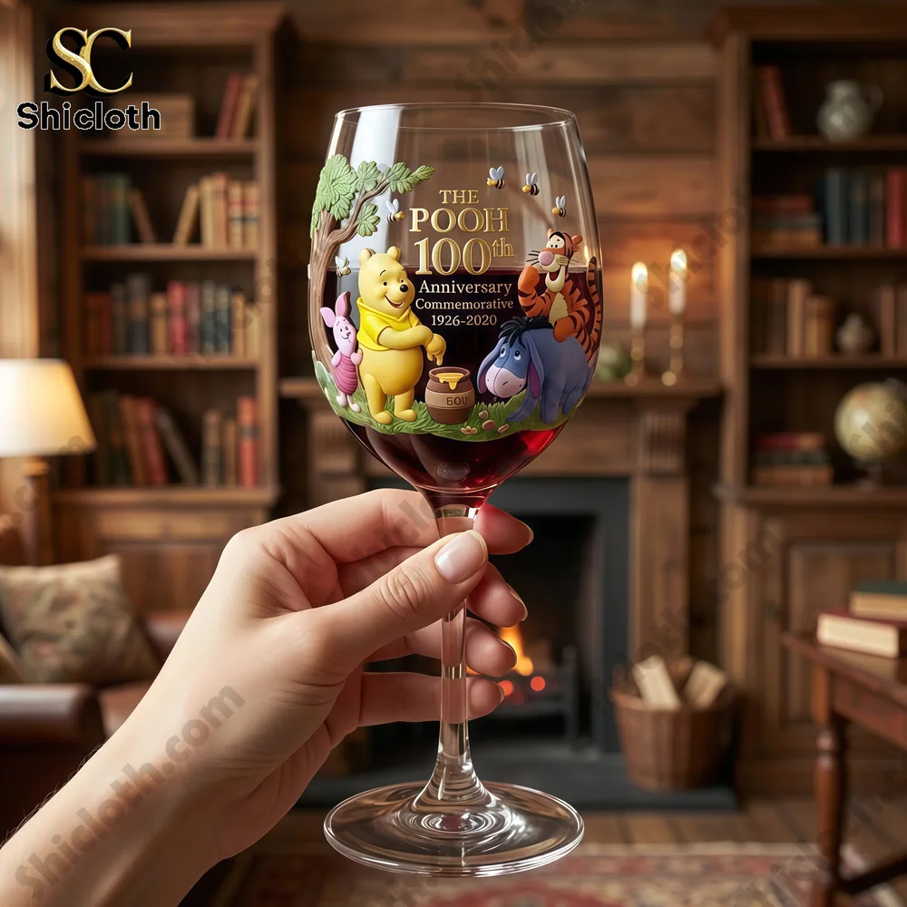 Pooh themed wine glass held in a cozy living room!
