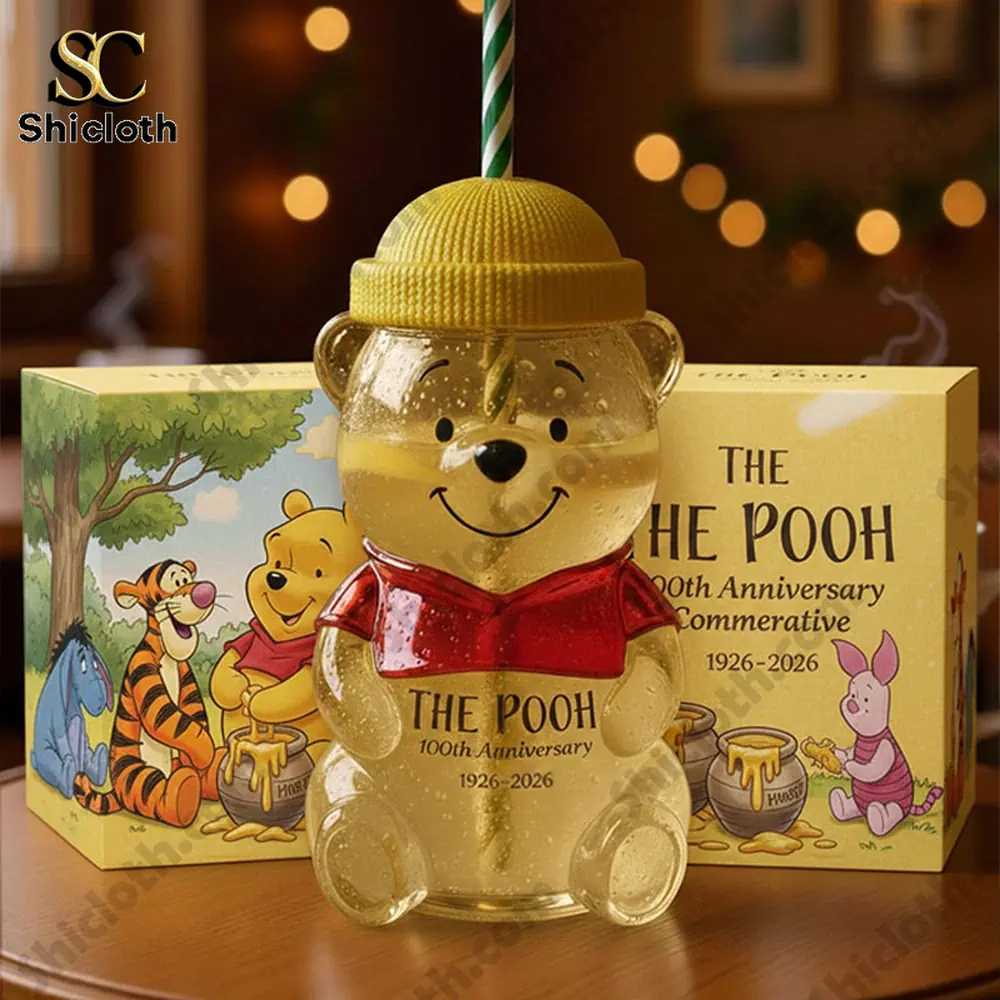 Pooh bear shaped anniversary drink cup displayed in front of illustrated gift box!