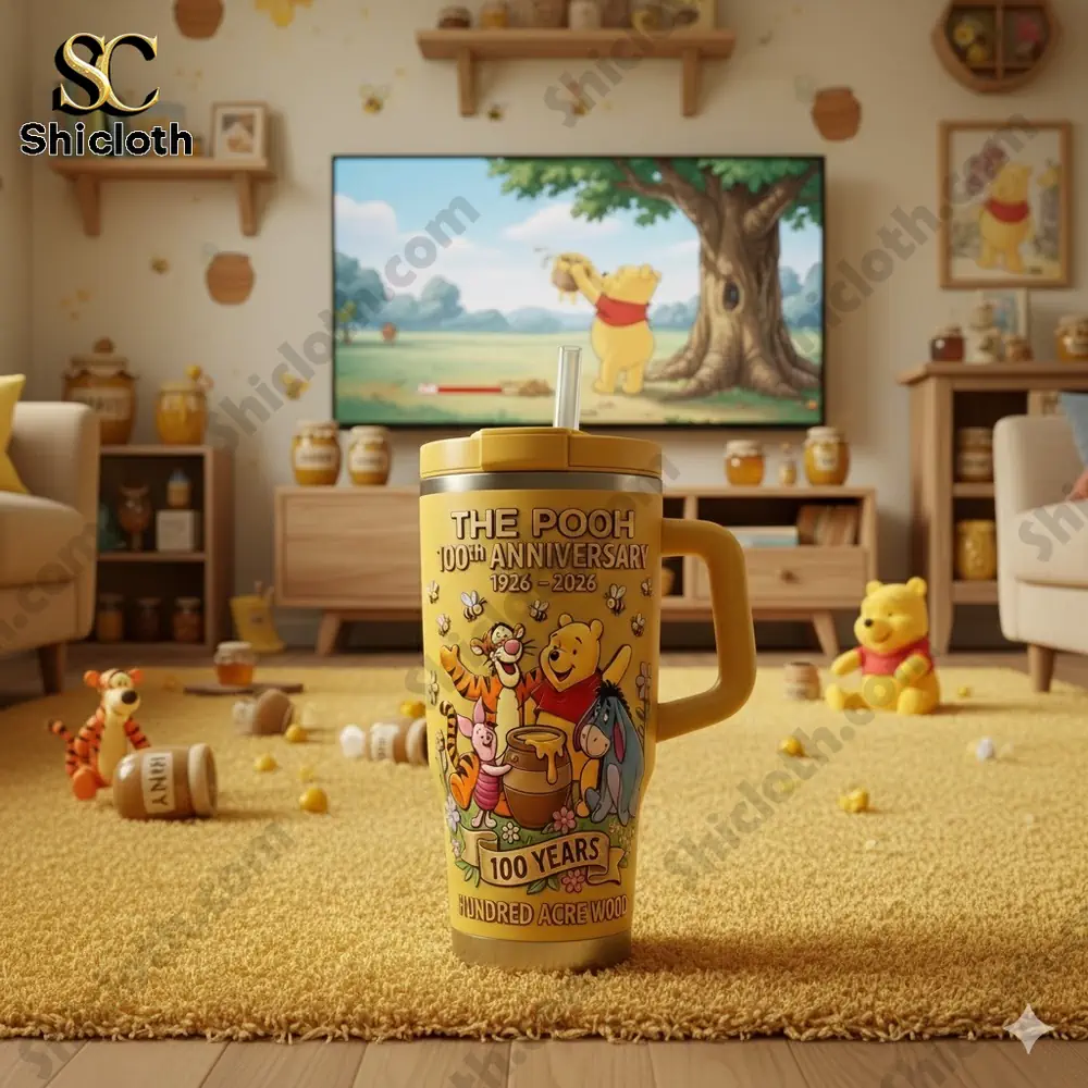 Pooh anniversary mug on cozy honey themed living room floor!